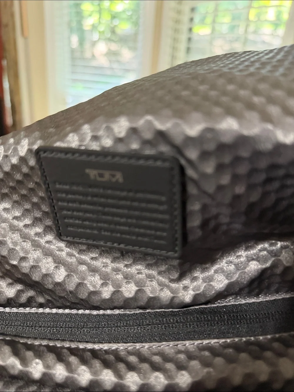 Tumi Black Roll-Top Backpack with Front Pockets